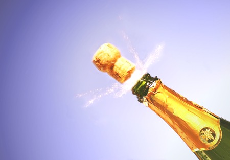 Champagne bottle explodingの写真素材