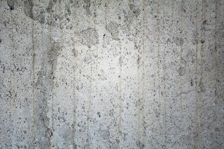 Cement foundation wall texture - grey cracks, grungy backgroundの写真素材