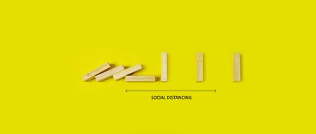 Social Distancing concept - bricks spaced apart so they don't fall showing social distancingの写真素材