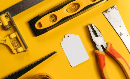 diy tools on yellow background. DIY toolsの写真素材