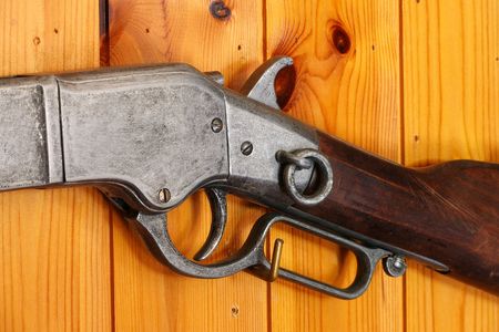 rifle  on tje wall