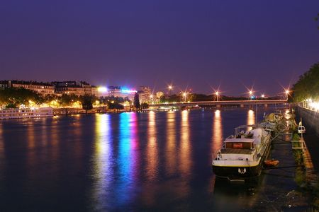 barge on the quay at lyon in franceの写真素材