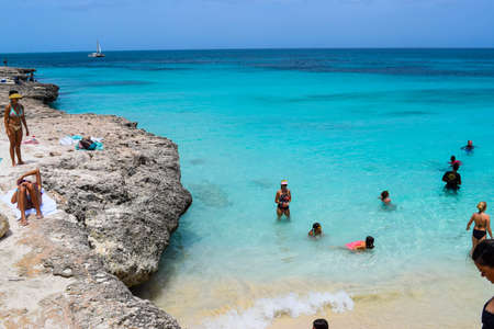 Arikok Natural Park on the island of Aruba in the Caribbean Sea with deserts and ocean waves on the rocky coastのeditorial素材