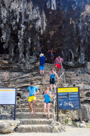 Arikok Natural Park on the island of Aruba in the Caribbean Sea with deserts and ocean waves on the rocky coastのeditorial素材