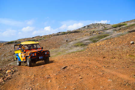 Arikok Natural Park on the island of Aruba in the Caribbean Sea with deserts and ocean waves on the rocky coastのeditorial素材
