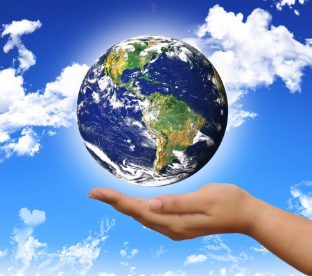 protect the world planet on the handの写真素材