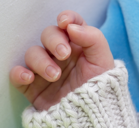 close up of a infant hand の写真素材