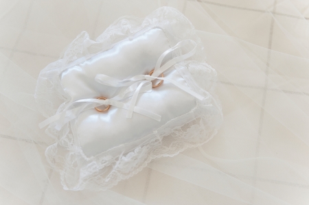 wedding rings on the pillow for the ceremonyの写真素材