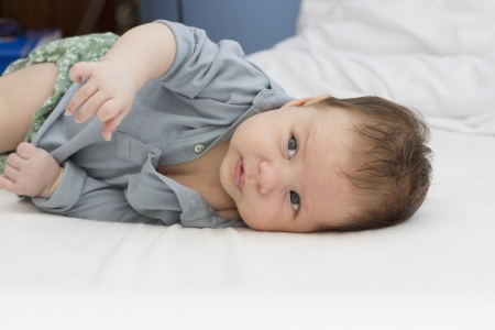 beautiful baby portrait on light backgroundの写真素材