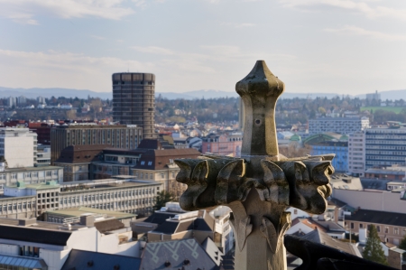 Gothic architectural element and the city modern neighborough  Basel, Switzerland 