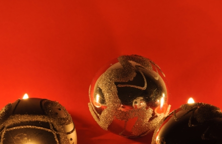 Christmas tree balls on a red background with copy space の写真素材