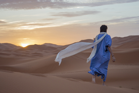 Girl in the Sahara desert, Moroccoの写真素材