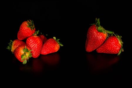 Strawbarries on black backgroundの写真素材