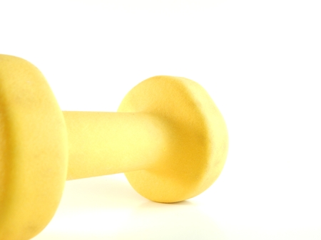 This is a picture of a dumbbell on a white background.の写真素材