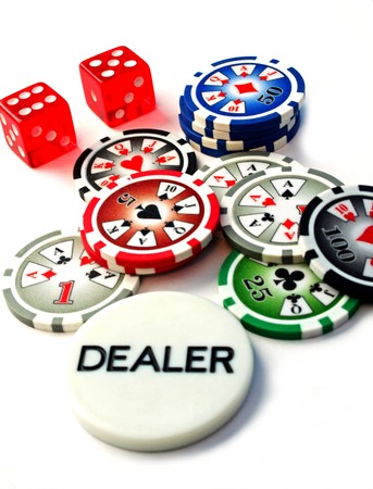 Poker Chips, Dice and Dealer Chip on a white backgroundの写真素材