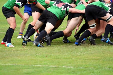 A halfback wait to clear the ball from a Rugby Union Scrumの写真素材