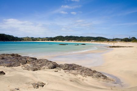 Matapouri Bay on a bright sunny day, a popular tourist destination in Northland, New Zealandの写真素材