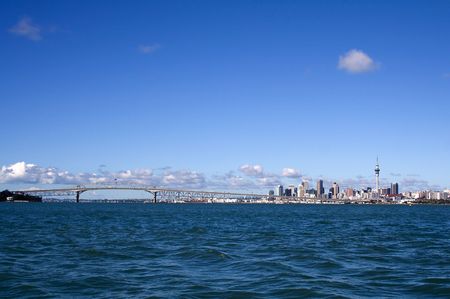 Auckland City, New Zealand viewed from the water on a bright sunny dayの写真素材