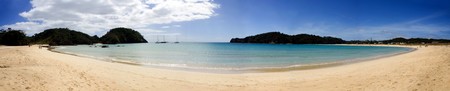 A beautiful panorama of Matapouri Bay, a popular tourist destination in Northland, New Zealandの写真素材