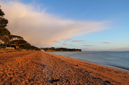 Cheltenham Beach at sunrise, Devonport, Auckland, New Zealandの写真素材