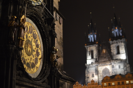 clock with church at nightの写真素材