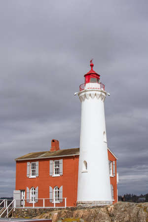 Lighthouse on a cloudy day in Newfoundland and Labrador, Canada.の写真素材