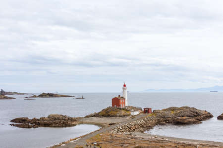 Lighthouse on a cloudy day in Newfoundland and Labrador, Canada.の写真素材