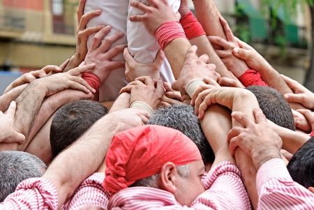 Barcelona, Spain - May 8, 2011 - Castellers of Tarragona building traditional human towerのeditorial素材