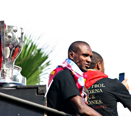 FC Barcelona players celebrate their 4th UEFA Champions league title on top of an open bus during a parade during the streets of Barcelona, Spain on May 29, 2011 one day after winning the final match against Manchester United at Wembley Stadium London, UKのeditorial素材