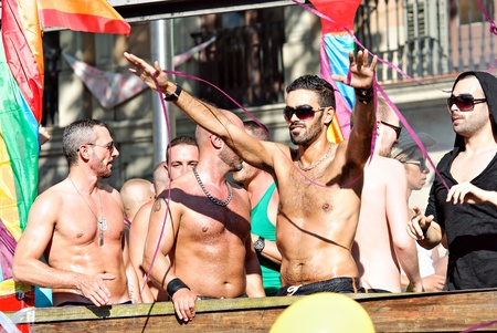 Participants dancing at Barcelona Pride 2011 - on 26th of June 2011 in the center of Barcelona, Spainのeditorial素材
