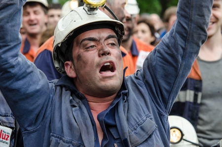 About 25,000 miners and residents of the miners zone of Asturias demonstrate against close-downs and financial cuts in the carbon sector on June 18th, 2012 in Langreo, Spainのeditorial素材
