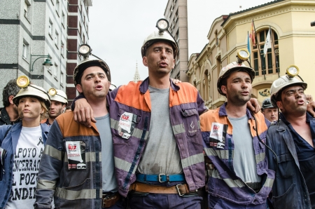 About 25,000 miners and residents of the miners zone of Asturias demonstrate against close-downs and financial cuts in the carbon sector on June 18th, 2012 in Langreo, Spainのeditorial素材