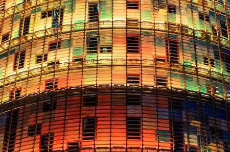 Barcelona, Spain. 12th December 2012: The Torre Agbar pictured lit up for the Christmas season with more than 4,500 lights that can operate independently using LED technology displaying a seasonal design out of moving lights and colorsのeditorial素材