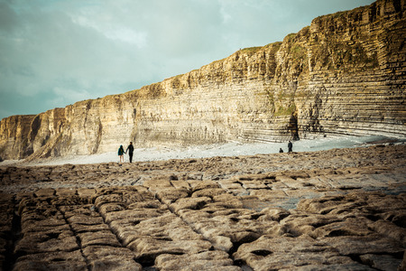 Walkers at Nash Point, a headland and beach in south Wales,is a popular location for walkers and bikersの写真素材