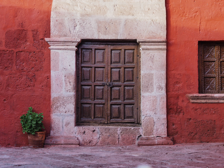 Wooden door in Santa Catalina Monastery in Arequipa, Peruの写真素材