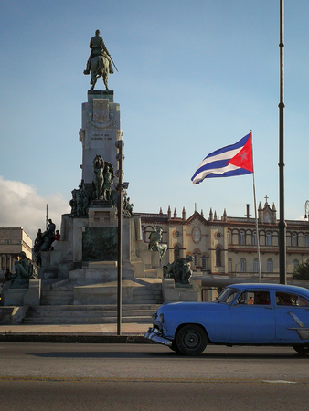 Flag of Cuba and driving car in Havanaのeditorial素材