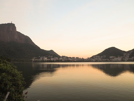 Sunrise view over Lagoa Rodrigo de Freitas and Cristo Redentor, Rio de Janeiro, Brazilの写真素材