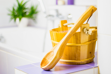 Sauna tub and dipper in the bathroom.の写真素材
