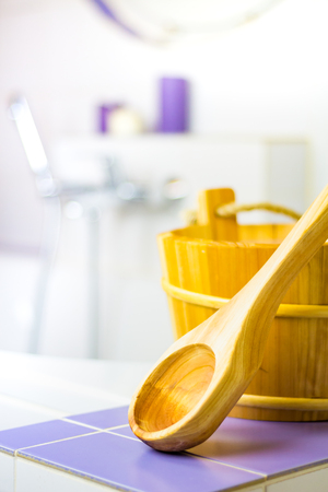 Sauna tub and dipper in the bathroom.の写真素材