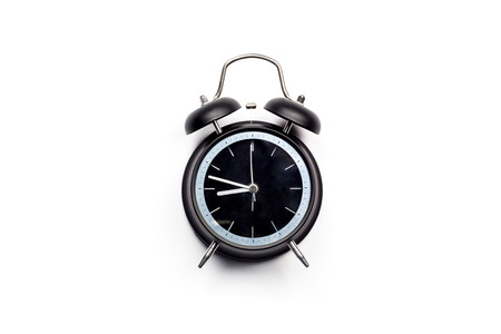 Isolated alarm clock in retro look.