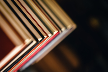 A stack of old, dirty books.の写真素材