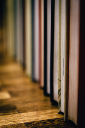 A stack of old, dirty books.の写真素材
