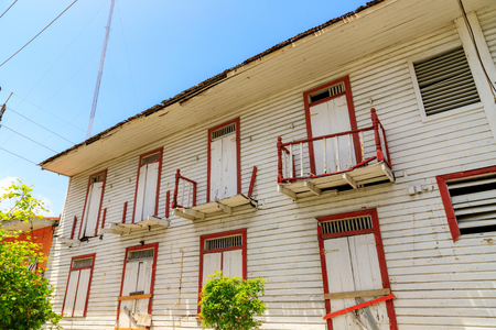 Old, warped, white, wooden house. Puerto Plata, Dominican Republicの写真素材