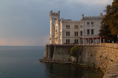 Miramare Castle in Trieste Italy, a white castle overhanging the seaのeditorial素材