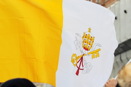 ROME, ITALY - March 17: A flag of Vatican City in St. Peter Square before the first Angelus prayer of Pope Francis I on March 17, 2013 in Vatican City, Rome, Italyのeditorial素材