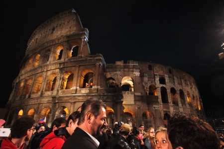 29th March 2013, Colosseum Square, Rome: People waiting for the Stations of the Cross chaired by the Pope Francis I around the coliseum on Good Friday.のeditorial素材