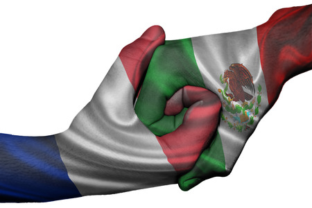 Diplomatic handshake between countries: flags of France and Mexico overprinted the two handsの写真素材