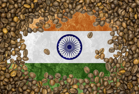 National country flag of India under a background of roasted brown coffee beansの写真素材
