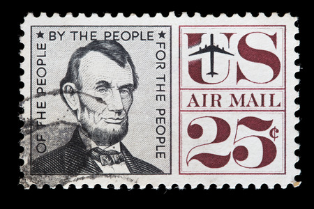 UNITED STATES OF AMERICA - CIRCA 1960: A used air mail postage stamp printed in United States shows the President Abraham Lincoln, circa 1960のeditorial素材