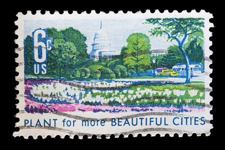 UNITED STATES OF AMERICA - CIRCA 1969: A used postage stamp printed in United States shows an ornamental garden to encourage the beautification of cities with the slogan Plant for more beautiful cities, circa 1969のeditorial素材